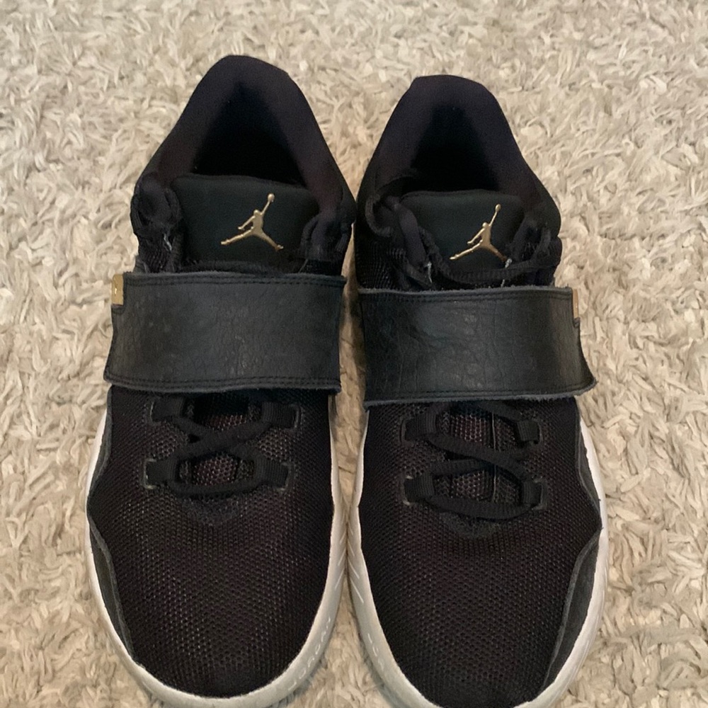 Used black and gold Jordan’s